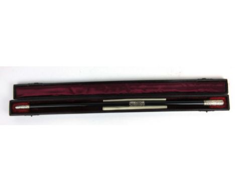 An ebony and silver mounted swagger stick inscribed 'Presented to T.G. Short ESQ as a mark of esteem by the members of St. Be
