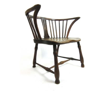 A late 18th century and later elm comb back Windsor chair with a burr elm seat on turned legs and stretchers, h. 57 cm, w. 58