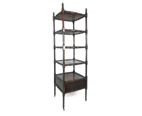 A Regency mahogany whatnot with five tiers over a single drawer and turned supports on brass cup castors, h. 155 cm, w. 43 cm