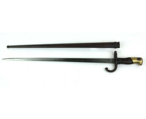 A 19th century Gras bayonet dated 1878, with clear script to spine of blade, with original scabbard with matching serial numb