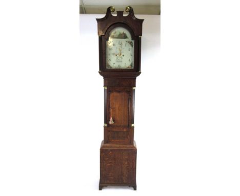 An 18th century oak and mahogany long case clock, the enameled face with painted spandrels, pierced and gilded hands, second 
