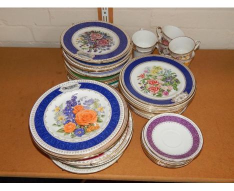 A group of Wedgwood Spode and Royal Doulton botanical porcelain plates, tea cups and saucers, for the Royal Horticultural Soc