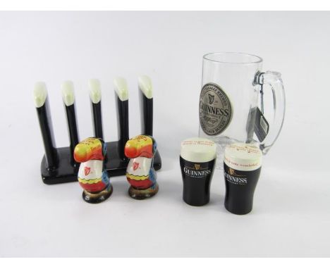 Various Guinness related items, to include a pair of Carltonware Toucan cruets, two pints of Guinness cruet, a Guinness & Co 