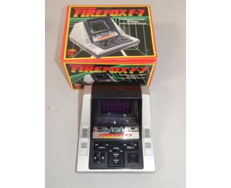A Grandstand Firefox F-7, space action, 3D effect, twin speaker sound, boxed.