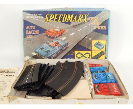 A Marx Toys Speedmarx battery operated auto racing set, with over and under track, boxed.