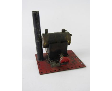 A small vintage model steam standing engine.