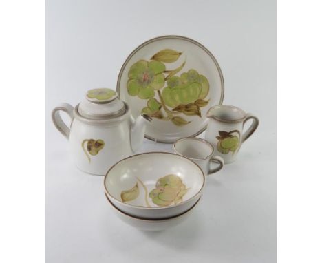 A Denby stoneware part dinner and tea service in the Troubadour pattern,  decorated with green flowers, etc.