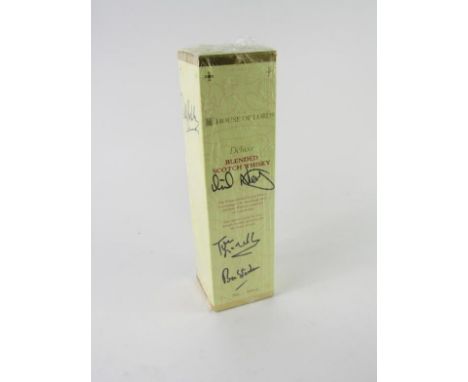 A bottle of House of Lords blended Scotch whisky, signed by thirteen members including Lord Ashdown, 70cl, sold on behalf of 