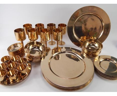 A Siam polished bronze late 20thC part dinner service, comprising eight dinner, dessert and side plates, bowls, goblets and c