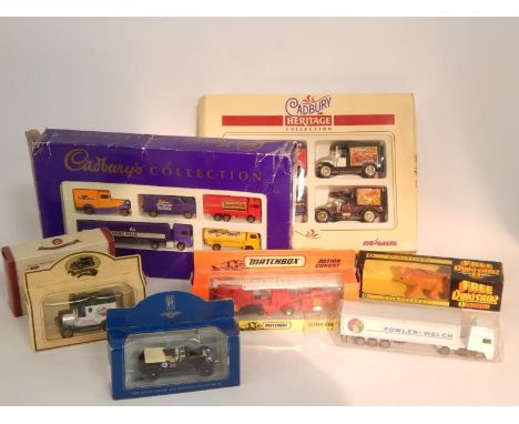 Oxford Matchbox Corgi and other die cast vintage trucks, motor cars and lorries, and model dinosaurs, boxed, together with a 