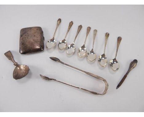 A Victorian silver fiddle and shell pattern caddy spoon and sugar tongs, London 1863/4 case, monogram engraved, Birmingham 19