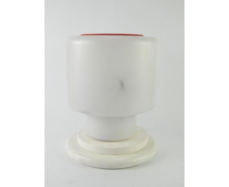 A retro painted white glass table lamp, of cylindrical form, raised on a stepped plastic base, 31cm high.