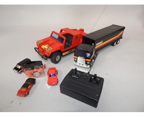 A Shinsei radio controlled Firefox rally car, Buddy Corp lorry, Knickerbocker Toys wrist car, and sundry die cast vehicles, (