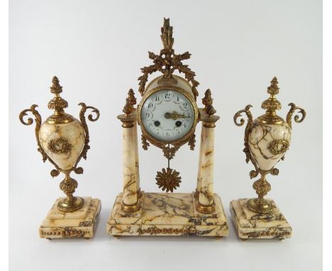 A French late 19thC cream marble and brass portico clock garniture, the enamel dial painted with rose swags and Arabic numera