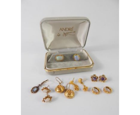 A pair of opal oval earrings, set in yellow metal, stamped 18ct, five further pairs of gold and gem set earrings, and a singl