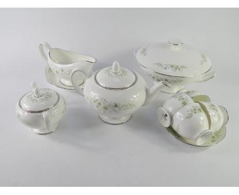 A Wedgwood porcelain dinner and tea service decorated in the Westbury pattern, comprising vegetable tureen and cover, sauce b