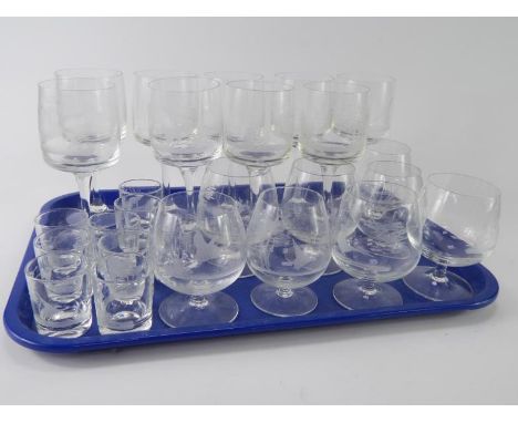 A part suite of Reims table glassware etched with game, comprising nine wine glasses, eight cognac glasses and nine tots, (26