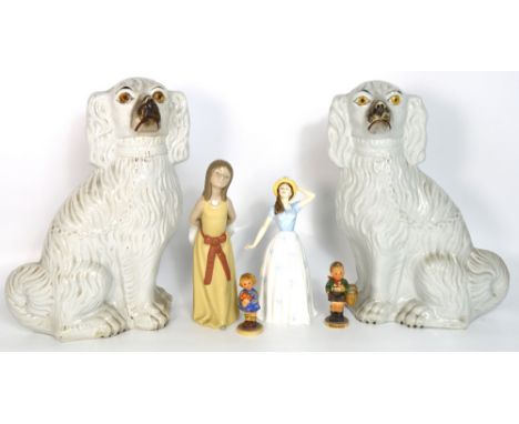 A pair of 19th century Staffordshire spaniels, two Goebel figurines, one depicting a little girl the other a little boy, a Ro