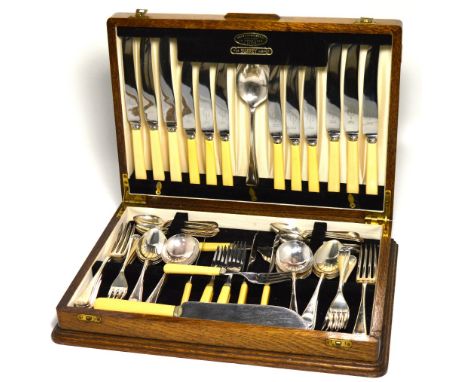 An oak cased canteen of silver plated cutlery containing approx sixty pieces of flatware.