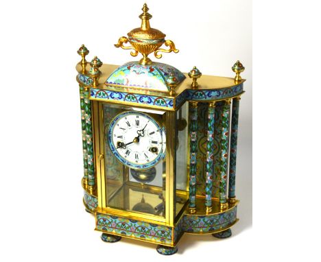 A 20th century French brass and cloisonné eight day mantel clock with four sided glass enclosing enamel dial set with Roman n