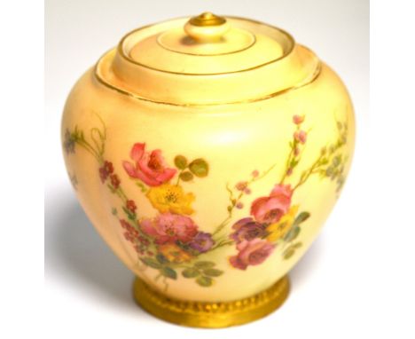A c.1900 Royal Worcester blush ivory pot and cover decorated with flowers, with green backstamp to underside, height 11cm.