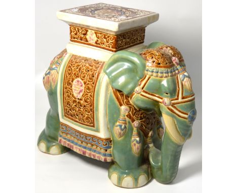 A modern jade ground decorative ceramic elephant, height 44cm.