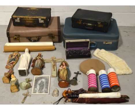 Four vintage suitcases, one containing umbrellas, a fur wrap etc and one containing a small quantity of religious artifacts (