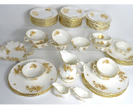 A quantity of gilt heightened Hammersley "Spode" dinnerware and teaware to include dinner plates, a jug, tea plates etc, also