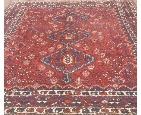A vintage Persian Qashqai carpet, 325 x 225cm.