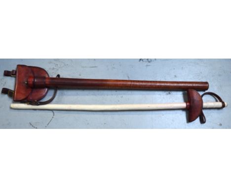 A c.1930s leather cased white painted mounted City Police Officers baton stick, length 96cm.