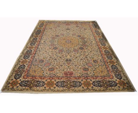 A Middle Eastern tan ground carpet decorated with floral sprays, 300 x 200cm.
