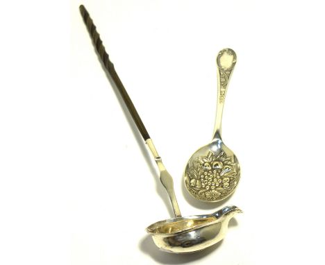 A Georgian white metal toddy ladle with inset coin and twisted baleen handle, length 40cm and a Victorian silver plated berry