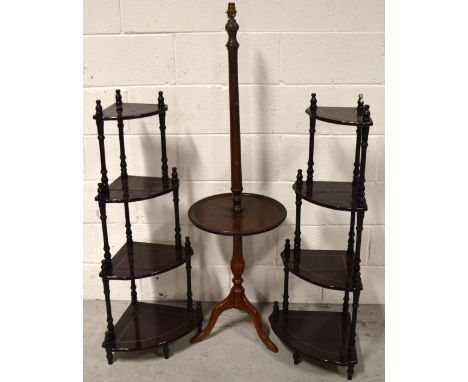 A pair of reproduction whatnots, height 100cm and a combination standard lamp/tripod occasional table, height 134cm (3).