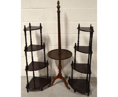 A pair of reproduction whatnots, height 100cm and a combination standard lamp/tripod occasional table, height 134cm (3).