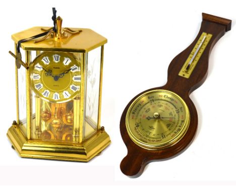 A Kundo quartz anniversary clock the gilded dial set with Roman numerals, height 22cm and a small modern mahogany cased barom