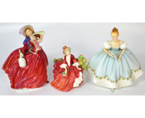 Three Royal Doulton figurines; "First Dance" HN2803, "Autumn Breezes" HN1934, "Lydia" HN1908 (3).