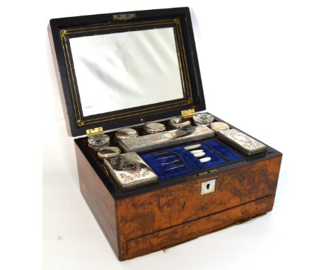 A Victorian walnut travelling case the hinged top set with central inlaid mother of pearl tablet enclosing fitted interior wi