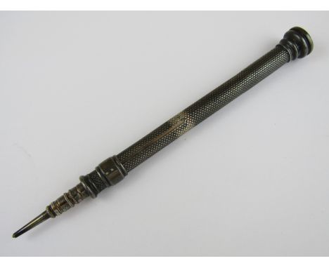 A Victorian silver Sampson Morden propelling pencil, engine turned, with hardstone seal bearing an engraved monogram, London,