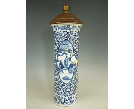 A Quing Chinese blue and white porcelain vase, of cylindrical form with everted rim, decorated with vignettes of characters s