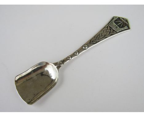 A Scottish John Hart Iona white metal preserve spoon, the terminal engraved and planished in depiction of a Viking long boat,