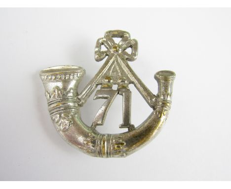 A 71st (Highland Light Infantry) strung bugle badge