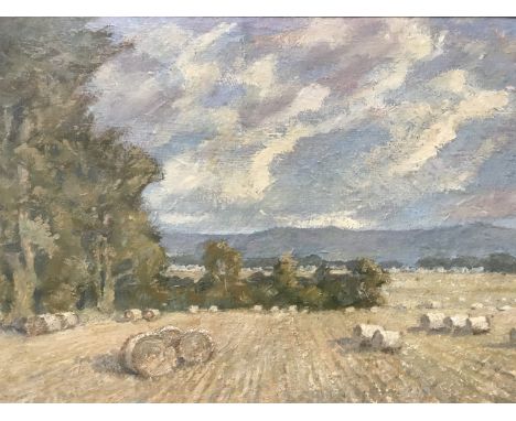 Derek Daniels (b.1949) Remnants of Harvest, impressionist landscape view with hay bales, under a soft azure cloud smattered s