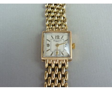 A vintage Baume and Mercier 18ct gold wristlet watch, with quartz movement, square silvered dial, subsidiary seconds and bato