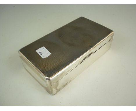 An Elizabeth II silver table cigarette box, of rectangular section with engine turned cover, Adie Brothers Ltd, Birmingham, 1