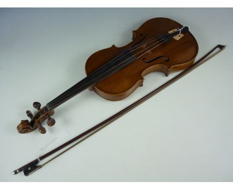 An early 20th Century violin and bow, the violin by Alfred Moritz of Germany, the violin labelled as a Stradivarius copy and 