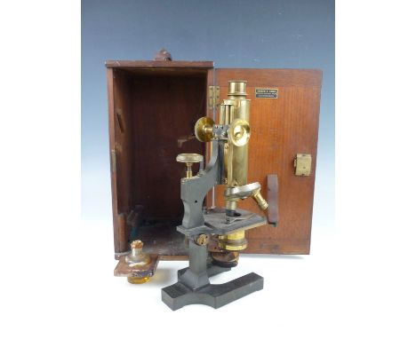 A late 19th / early 20th Century monocular microscope by Watson & Son of London, having a two-lens turret, and sub-stage cond