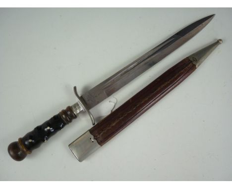 A late 19th Century German hunting dagger, having a turned and knobbly horn hilt with re-curved steel cross-guard, the Soling