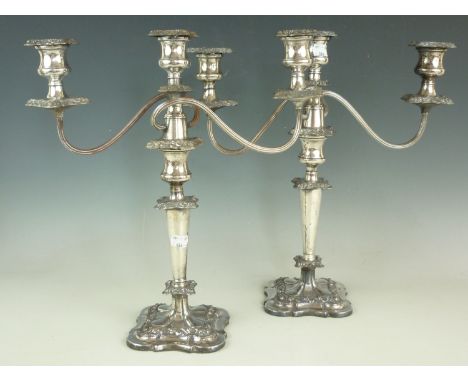 A pair of Victorian two-branch three light electroplate candelabra, 41 cm 