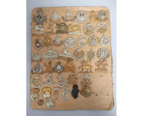 British Militaria Interest. Tray containing a large quantity of cap badges to include Sherwood Foresters, Somerset Light Infa