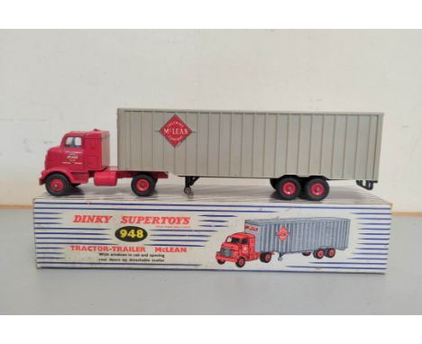 Dinky Supertoys. Boxed Tractor-Trailer "McLean" 948. Red die-cast cab with grey plastic trailer. 